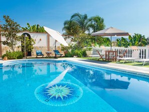 Water, Plant, Sky, Property, Swimming Pool, Tree, Azure, Building, Outdoor Furniture, Shade