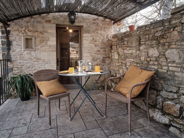 Furniture, Table, Chair, Wood, Outdoor Table, Interior Design, Building, Brick, Wall, Floor