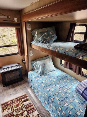 2nd bed has 3 adult bunk beds we supply all the bedding