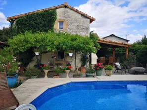 Gite, dining area and pool
