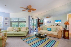 Bright and colorful living room with plenty of seating for the whole gang. Cable TV included.