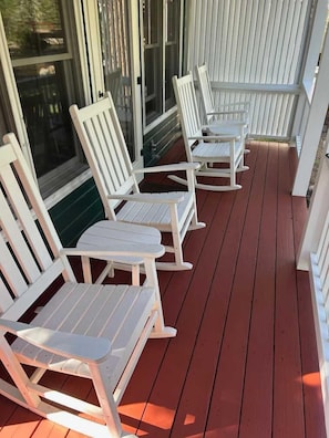 Take in the postcard views from the back porch rocking chairs