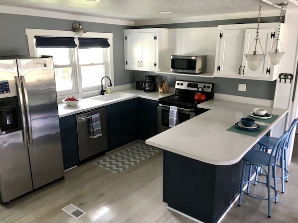 Recently renovated kitchen with stainless steel appliances