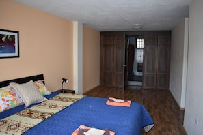 Second view of master bedroom with entry to master bathroom.