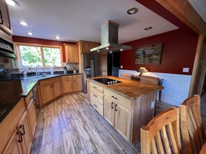 Spacious kitchen with granite countertops