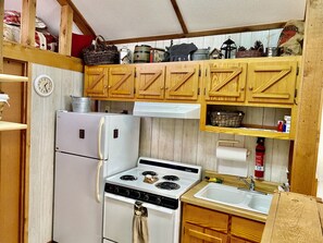 Full kitchen including small crockpot and coffee maker (pods)