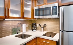 Cook a meal in your kitchen.