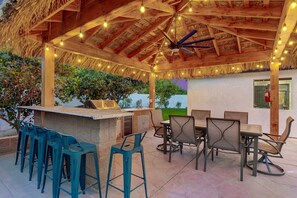 Dine al-fresco under the lighted gazebo or enjoy a cocktail from the counter height seating.