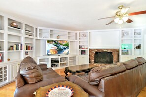 Luxury entertainment area off the open floor plan near the dining area.