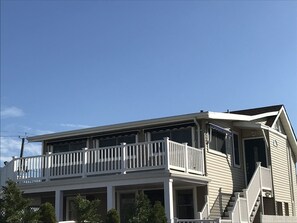 Ocean view, upper level home with lovely wrap around deck.