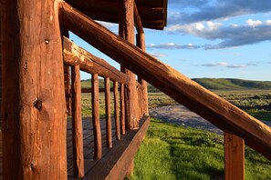 The front deck offers spectacular views of the Madison Valley landscape