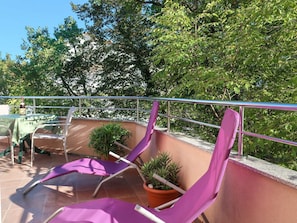 Plant, Tree, Purple, Shade, Outdoor Furniture, Wood, Fence, Terrestrial Plant, Leisure, Urban Design