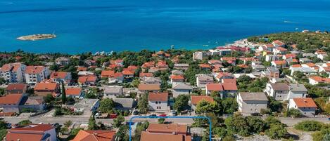 Water, Sky, Building, Property, Blue, Azure, Coastal And Oceanic Landforms, Urban Design, Tree, House