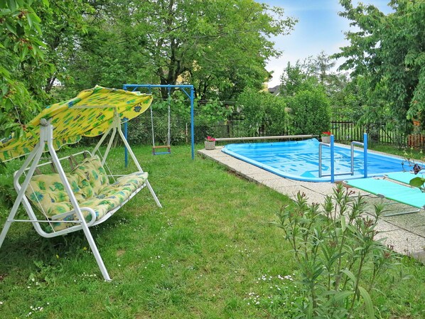 Water, Sky, Plant, Cloud, Tree, Grass, Shade, Outdoor Furniture, Swimming Pool, Leisure