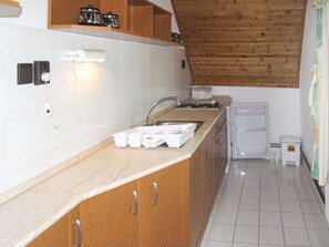 Kitchen Sink, Cabinetry, Countertop, Sink, Tap, Kitchen Appliance, Kitchen, Wood, Flooring, Building