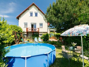 Plant, Property, Sky, Building, Green, Azure, Swimming Pool, Window, Shade, Architecture
