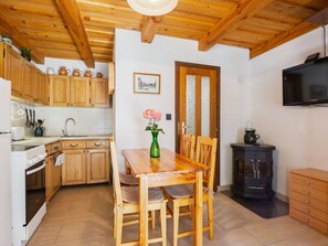 Furniture, Wood, Interior Design, Flooring, Floor, Room, Ceiling, Cabinetry, Kitchen, Countertop