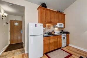 Fully Equipped Kitchen: "Modern appliances and ample storage in sleek kitchen design."