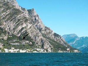Water, Sky, Mountain, Water Resources, Azure, Natural Landscape, Highland, Lake, Coastal And Oceanic Landforms, Terrain