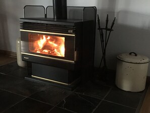 Warm up and relax in colder months by the cosy woodfire 