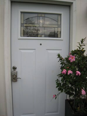 Rear/front door of the 1st floor, one bedroom apt.