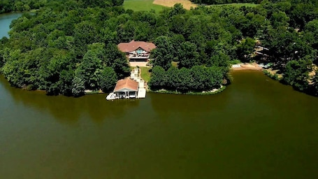 Aerie with boat dock and sun/swim deck. Doesn’t include beach on right.