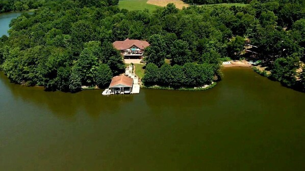 Aerie with boat dock and sun/swim deck. Doesn’t include beach on right. 