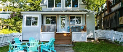 Enjoy the view and the fire pit in the Adirondack chairs