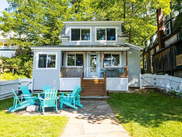 Enjoy the view and the fire pit in the Adirondack chairs