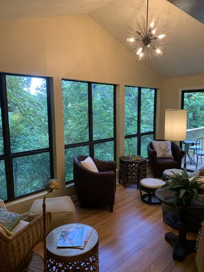 Sunroom off of the master bedroom.  Great spot to view the woods and be at peace