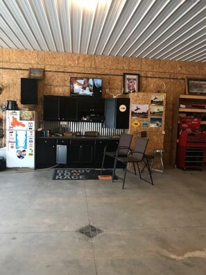 Large garage with tv and sound system for entertainment if the weather is bad. 