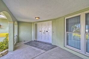 Front door with key pad 
parked 3adult and 2 kids bicycles beside the door