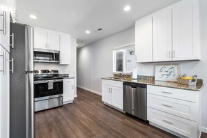 Spacious kitchen all new appliances and cookware