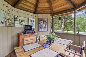 Outside dining area: barbecue.  Great views of the property and river
