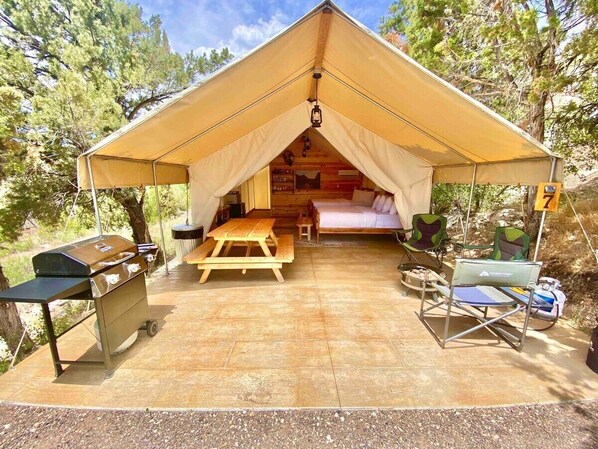 Glamping Tent 7 at East Zion Resort has 2 queen beds and a camping cot making it one of our best family friendly accommodations.  Conveniently located between Zion and Bryce Canyon National Parks, it's the perfect basecamp for your next adventure!