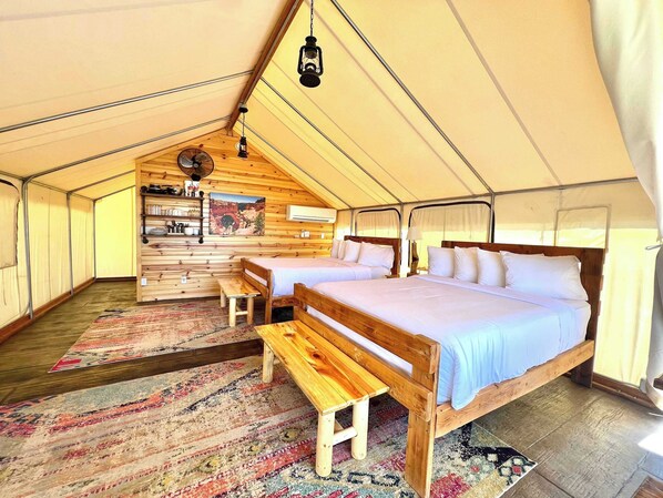 Glamping Tent 5 has two queen beds and cots available upon request making it one of our more family friendly accommodations.  