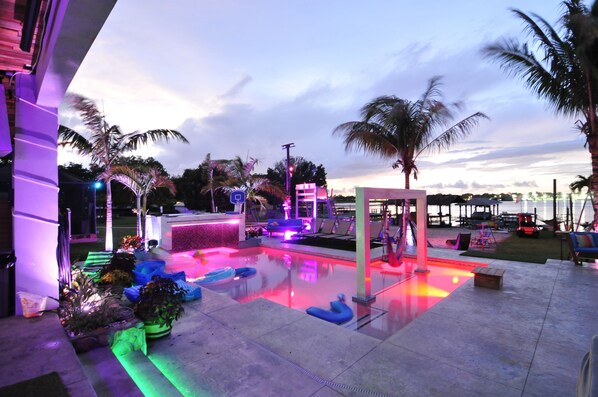 Private pool with every water feature you can imagine 10' wide grotto waterfall