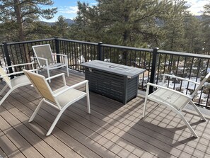 Master deck with gas fireplace. Perfect for coffee, wine or stargazing.