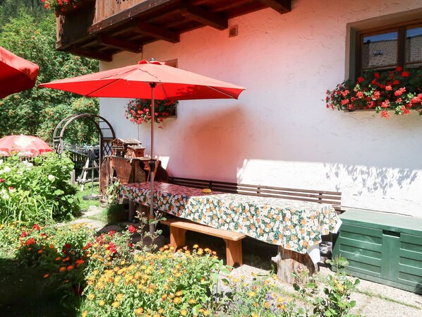 Plant, Property, Building, Flower, Leaf, Umbrella, Window, Orange, Shade, Lighting