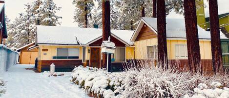 Snow covered Big Bear Cool Cabins, The Petite Cabin front