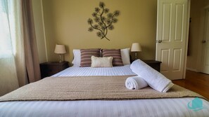 Queen bed in master bedroom