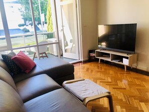 Living Room- Toshiba 55” TV with Ultra Chromecast and Sennheiser Headphones