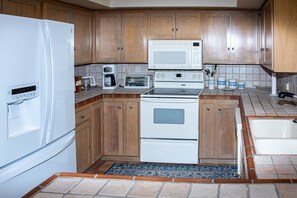 Full sized kitchen with anything you might need!