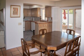 Dining table has seating for 6. There are 2 leaves in the guest closet