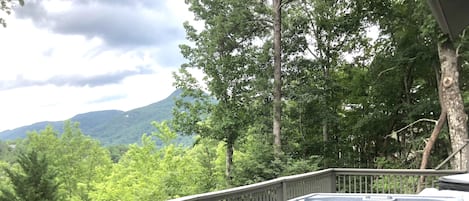 Amazing mountain views from the hot tube and lots of seating to relax.