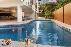 Private pool with sunbathing shelf and plenty of pool toys for the kids