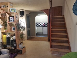 Looking into the dining area and kitchen