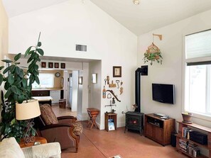 Fireplace, TV, and surround. 