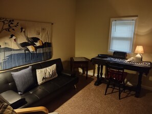 bedroom with desk and home office space