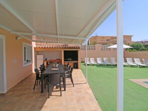 Furniture, Table, Building, Window, Chair, Plant, Shade, Sky, Flooring, Floor